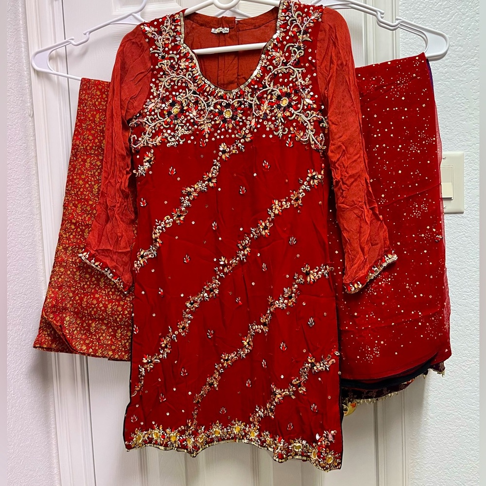 3 piece burnt orange suit with Palazzo pants.